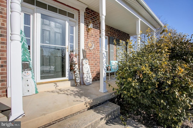 doorway to property with a porch