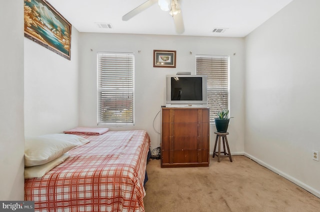 carpeted bedroom with ceiling fan