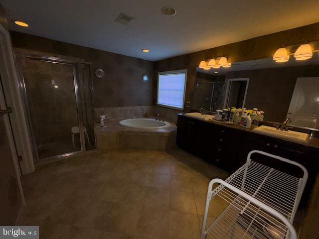 bathroom with vanity, plus walk in shower, and tile patterned flooring