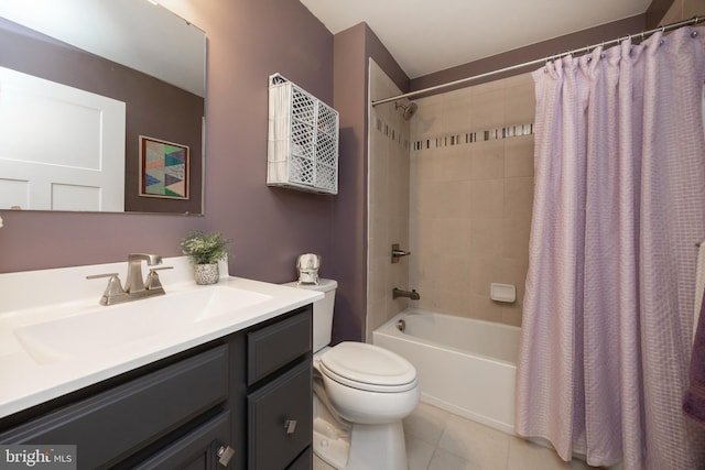 full bathroom with shower / tub combo with curtain, tile patterned floors, toilet, and vanity