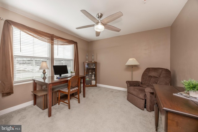 home office with light colored carpet and ceiling fan