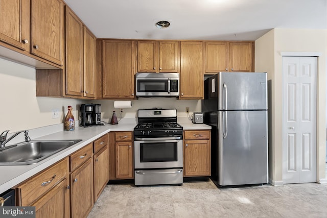 kitchen featuring appliances with stainless steel finishes and sink