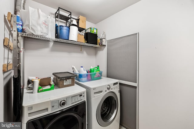 laundry room featuring separate washer and dryer