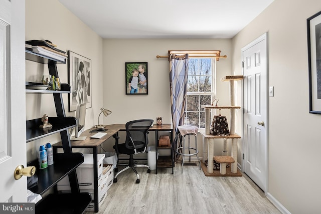 office area with light wood-type flooring