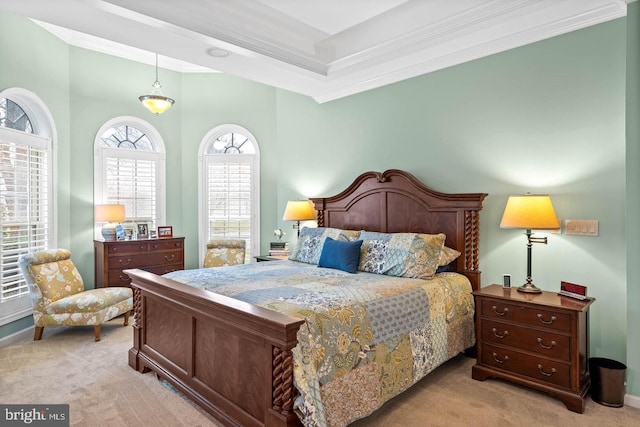 bedroom featuring crown molding and light colored carpet