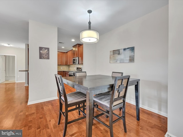 dining area featuring light hardwood / wood-style flooring