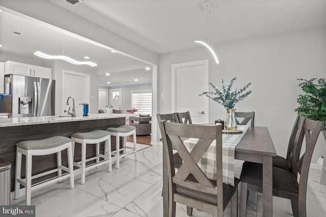 dining room with sink