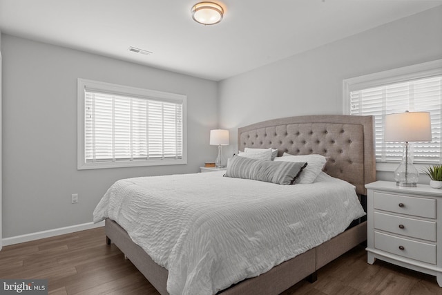 bedroom featuring dark hardwood / wood-style floors