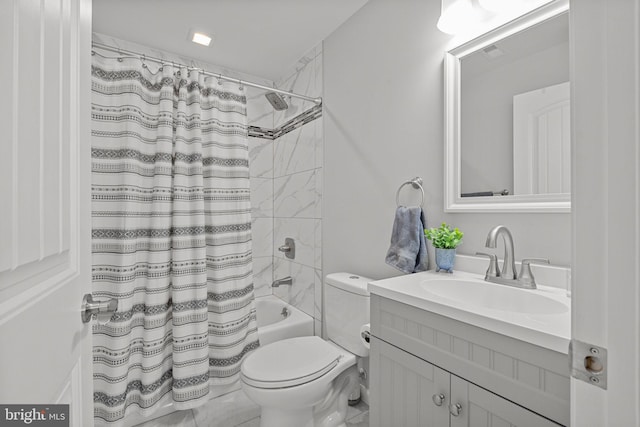 full bathroom with vanity, toilet, and shower / bath combo