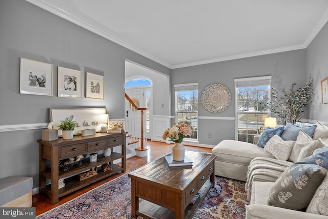 living room featuring crown molding and wood-type flooring