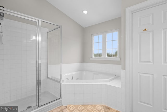 bathroom with separate shower and tub