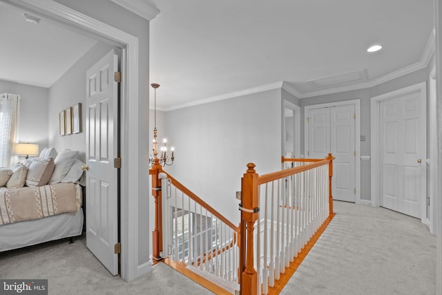 interior space with light carpet, a notable chandelier, and crown molding