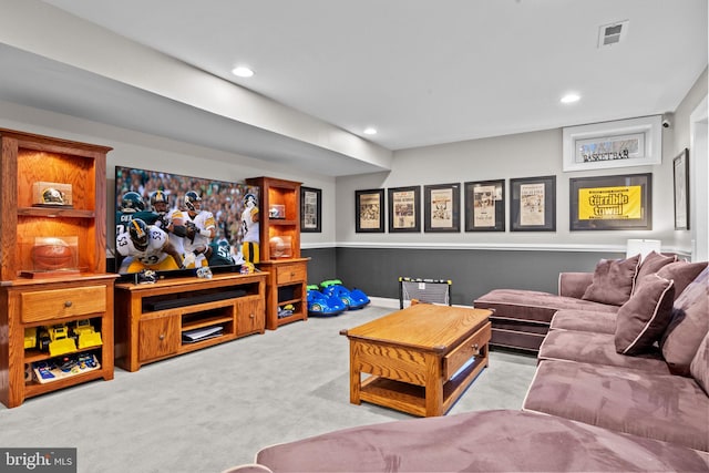 living room featuring light colored carpet