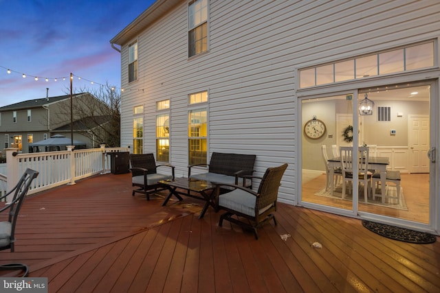 view of deck at dusk