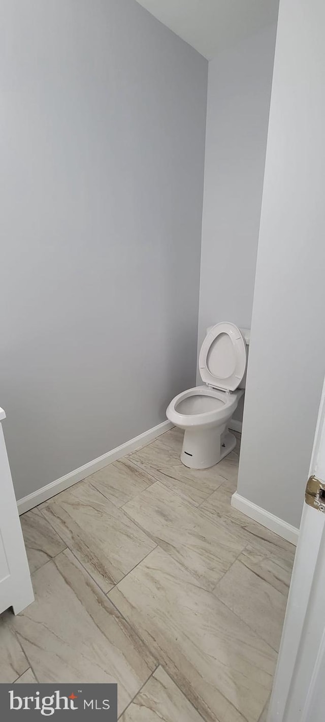 bathroom featuring toilet