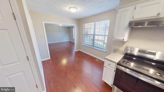 12459 Charter Oak Ct, Waldorf, MD 20601 - kitchen with stainless steel electric stove, dark hardwood / wood-style flooring, a textured ceiling, and white cabinets