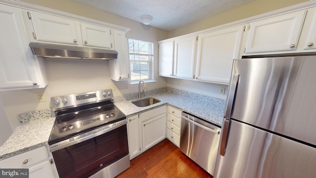 12459 Charter Oak Ct, Waldorf, MD 20601 - kitchen with appliances with stainless steel finishes, sink, and white cabinets