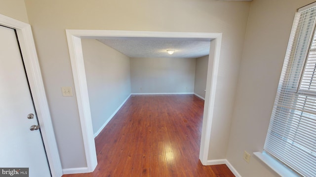 12459 Charter Oak Ct, Waldorf, MD 20601 - hall with dark wood-type flooring and a textured ceiling