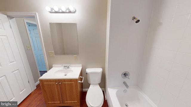 12459 Charter Oak Ct, Waldorf, MD 20601 - full bathroom featuring vanity, tiled shower / bath, hardwood / wood-style flooring, and toilet