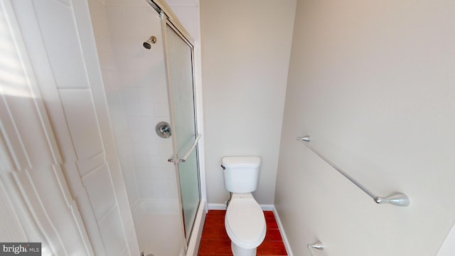 12459 Charter Oak Ct, Waldorf, MD 20601 - bathroom with toilet, a shower with shower door, and hardwood / wood-style floors