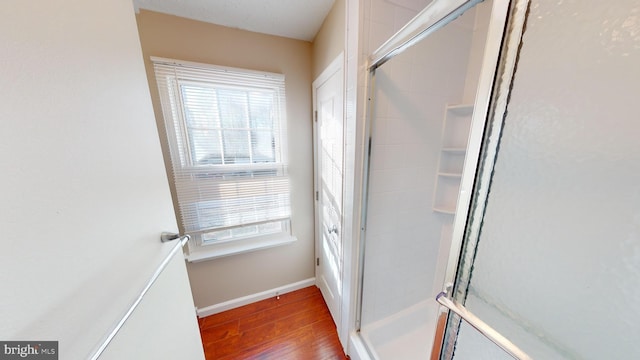 12459 Charter Oak Ct, Waldorf, MD 20601 - bathroom featuring hardwood / wood-style flooring and walk in shower