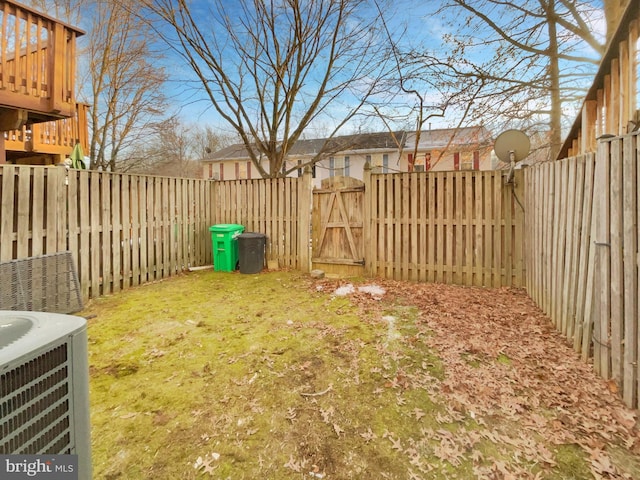 view of yard with central air condition unit