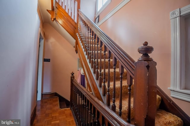 stairs with parquet floors