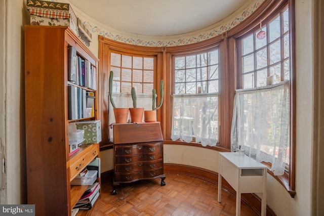 sitting room with light parquet flooring