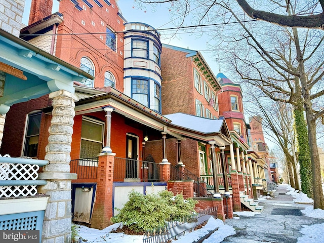 view of snow covered building