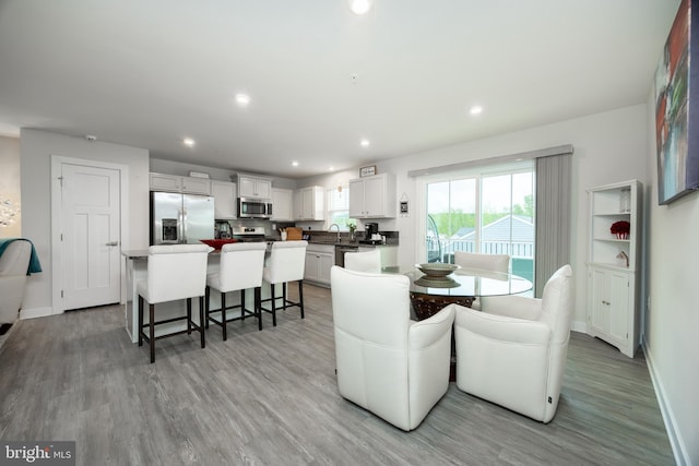 108 Zachary Way, Pottstown, PA 19464 - dining room featuring light wood-type flooring, baseboards, and recessed lighting