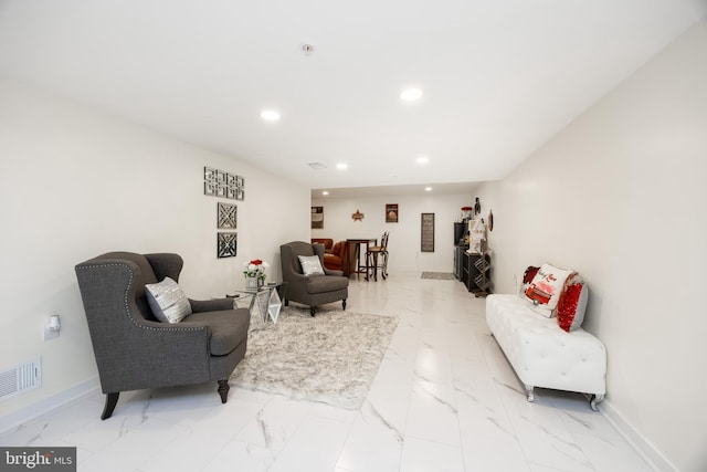 108 Zachary Way, Pottstown, PA 19464 - living area with light marble finish floors, recessed lighting, and baseboards