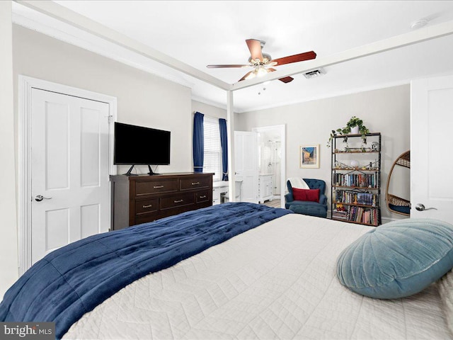 bedroom with crown molding and ceiling fan