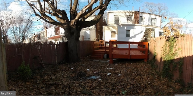 rear view of property with a deck