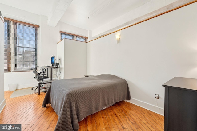 bedroom with light wood-type flooring