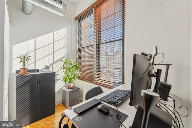 home office featuring light wood-type flooring