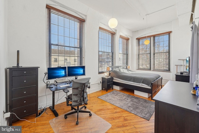 bedroom featuring light hardwood / wood-style floors