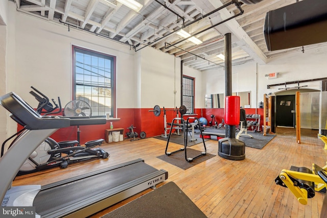 workout area featuring hardwood / wood-style floors