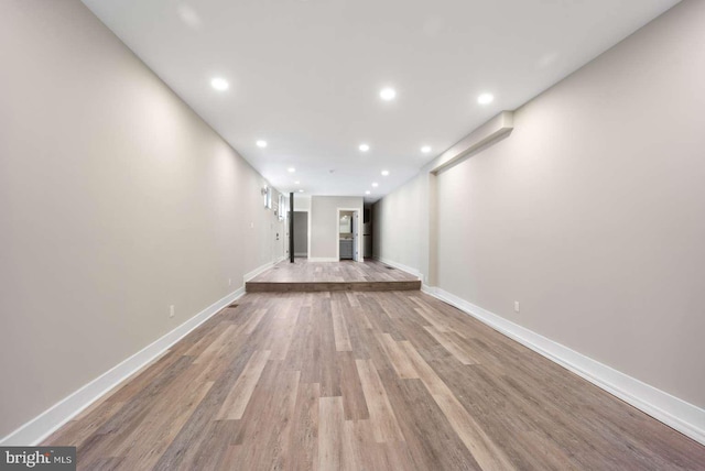 unfurnished living room with light wood-type flooring