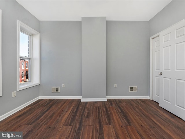 interior space with dark wood-type flooring