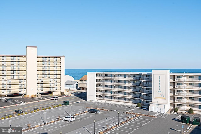 view of property with a water view