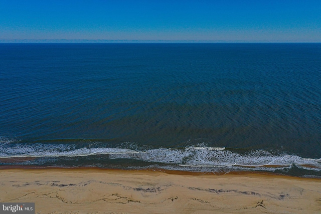 view of water feature with a beach view