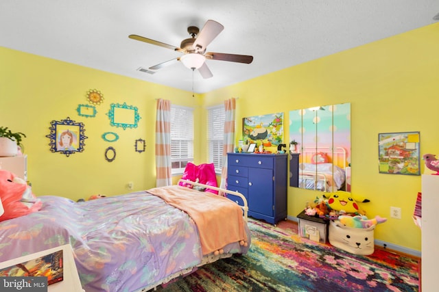 bedroom featuring ceiling fan