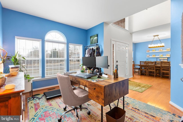 office space with light hardwood / wood-style floors