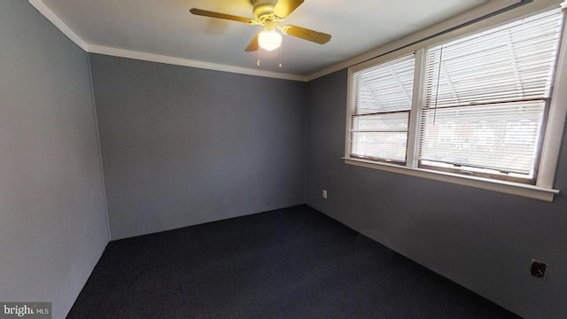 unfurnished room with ceiling fan and ornamental molding