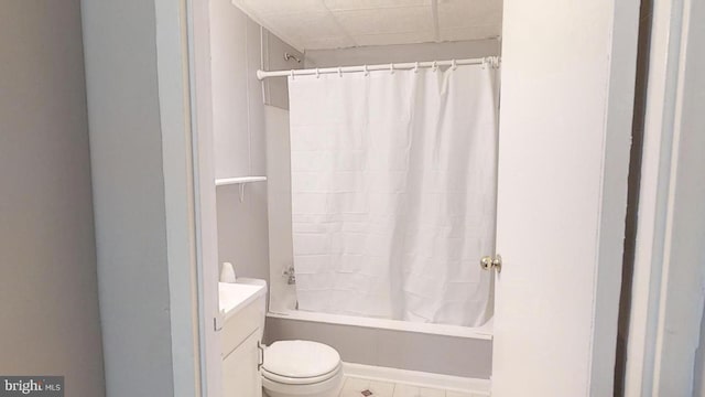 full bathroom with vanity, shower / bath combo, and toilet