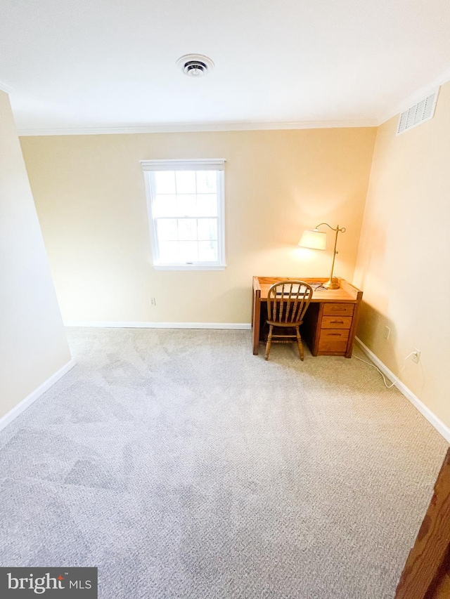 office area featuring ornamental molding and carpet flooring