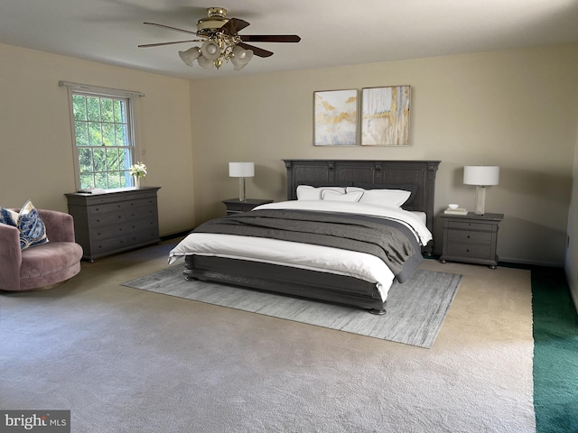 carpeted bedroom with ceiling fan