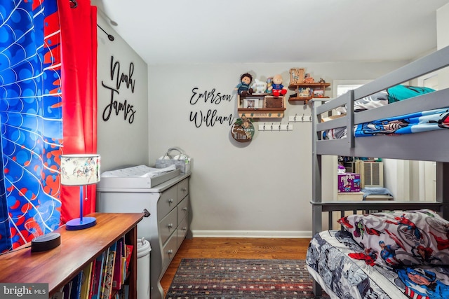 bedroom featuring dark wood-type flooring