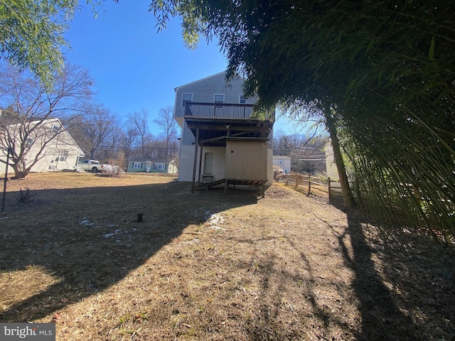 view of yard with a wooden deck