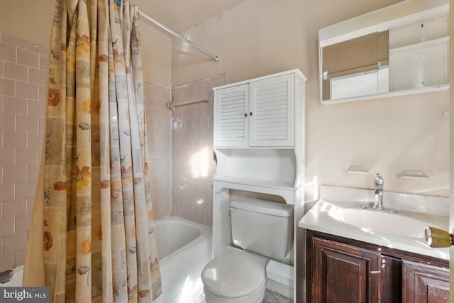 full bathroom featuring shower / tub combo, vanity, and toilet